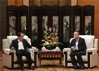 黃强會見博鼇亞洲論壇秘書長李保東